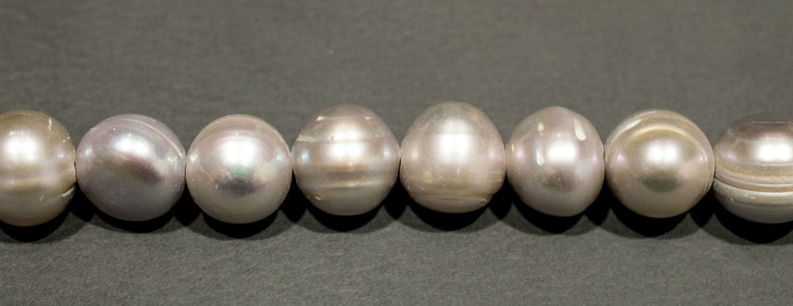 Perlenstrang Silber rund mit hohem Lüster in 12-13 mm